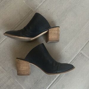 Edgy Black Leather Slip-on Booties